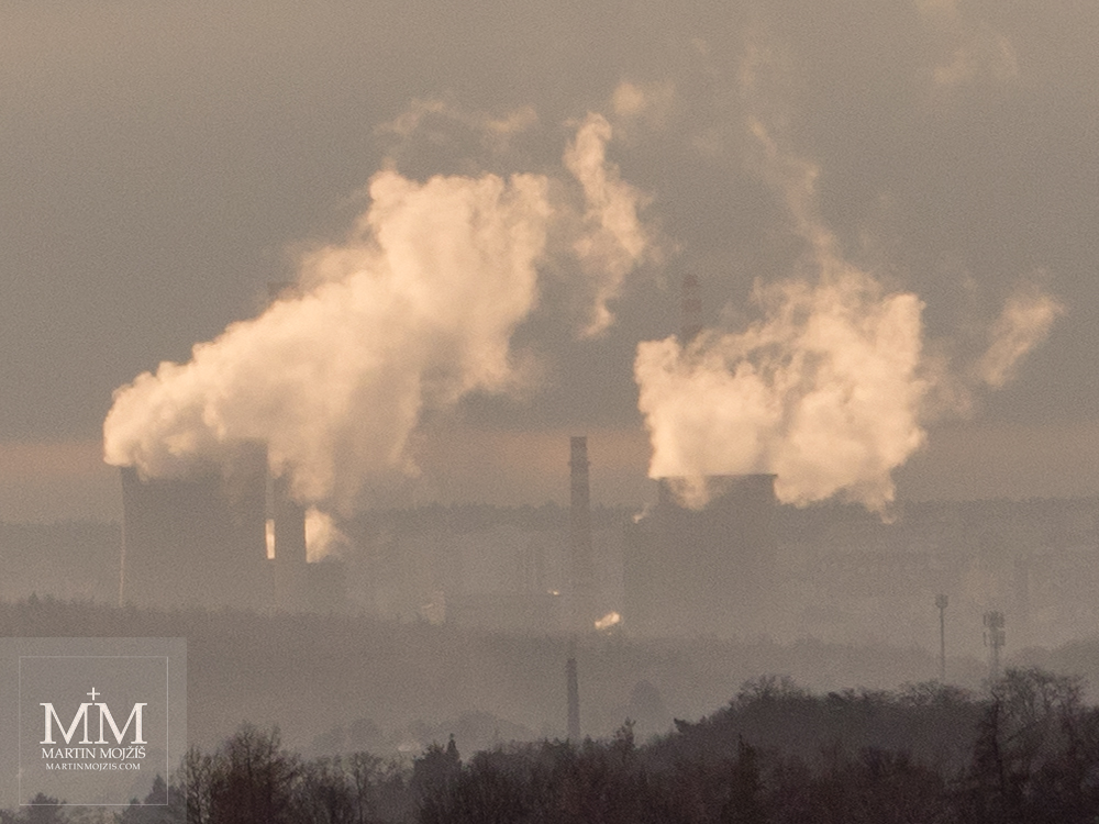 Factory, steam coming from cooling towers. Photograph created with the Olympus M. Zuiko digital ED 40 - 150 mm 1:2.8 PRO.